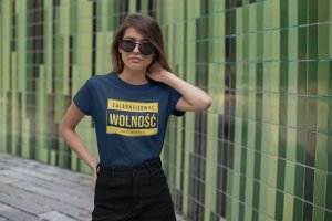 t-shirt-mockup-featuring-a-young-woman-posing-by-a-green-tiled-wall-27330