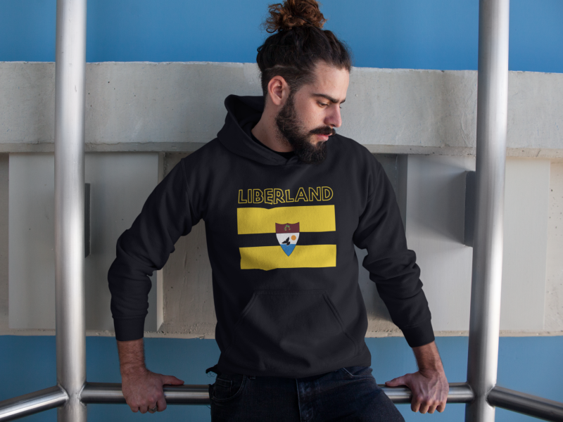 hipster-man-holding-on-to-a-rail-wearing-a-pullover-hoodie-template-a17759