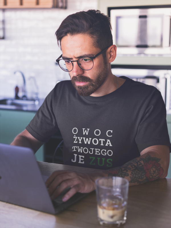 mockup-of-a-man-wearing-a-t-shirt-working-on-his-laptop-a20404