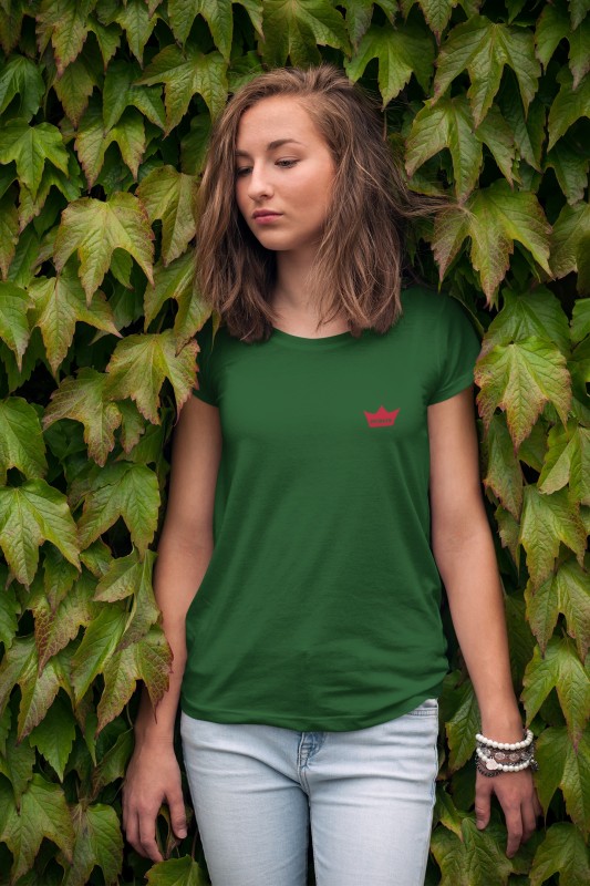 t-shirt-mockup-of-a-young-woman-leaning-on-a-wall-of-ivy-2761-el1