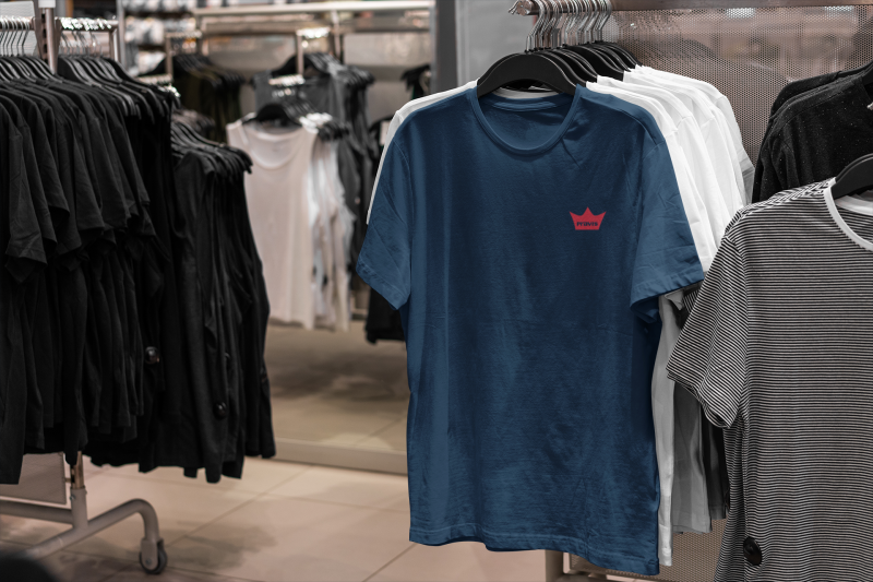 mockup-featuring-a-t-shirt-hanging-by-other-garments-at-a-store-3708-el1