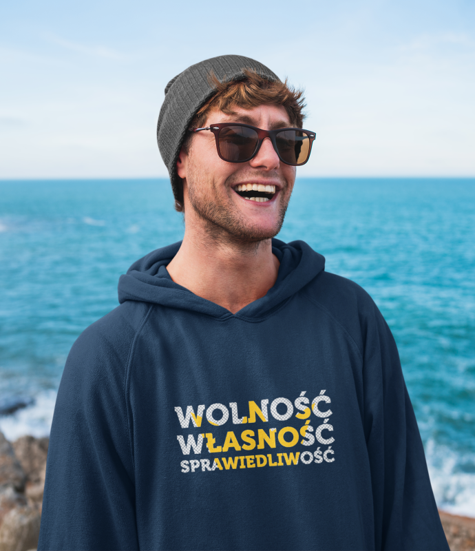 mockup-of-a-happy-man-with-a-hoodie-standing-by-the-beach-40478-r-el2