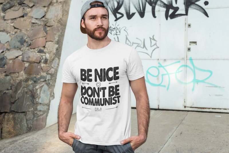 t-shirt-mockup-of-a-man-posing-in-front-of-a-graffiti-wall-28200