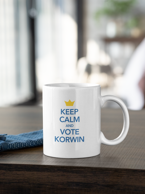 mockup-of-an-11-oz-coffee-mug-placed-on-a-dark-wooden-table-31320